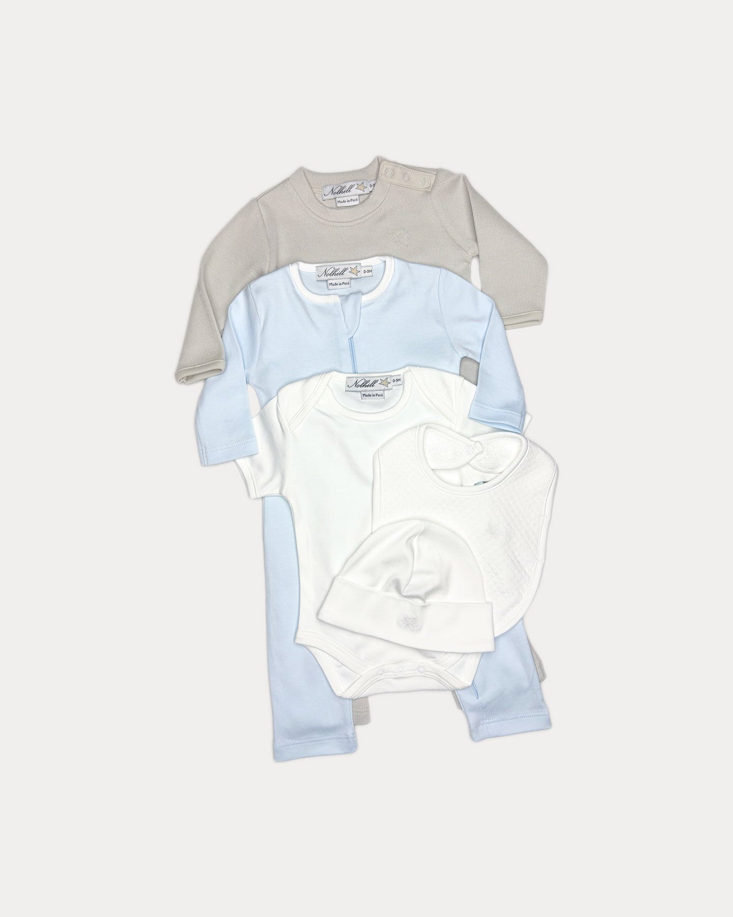 premium Pima cotton layette set, front view, bodysuit, bib, beane hat, newborn bundle in premium Pima cotton, gift ready set