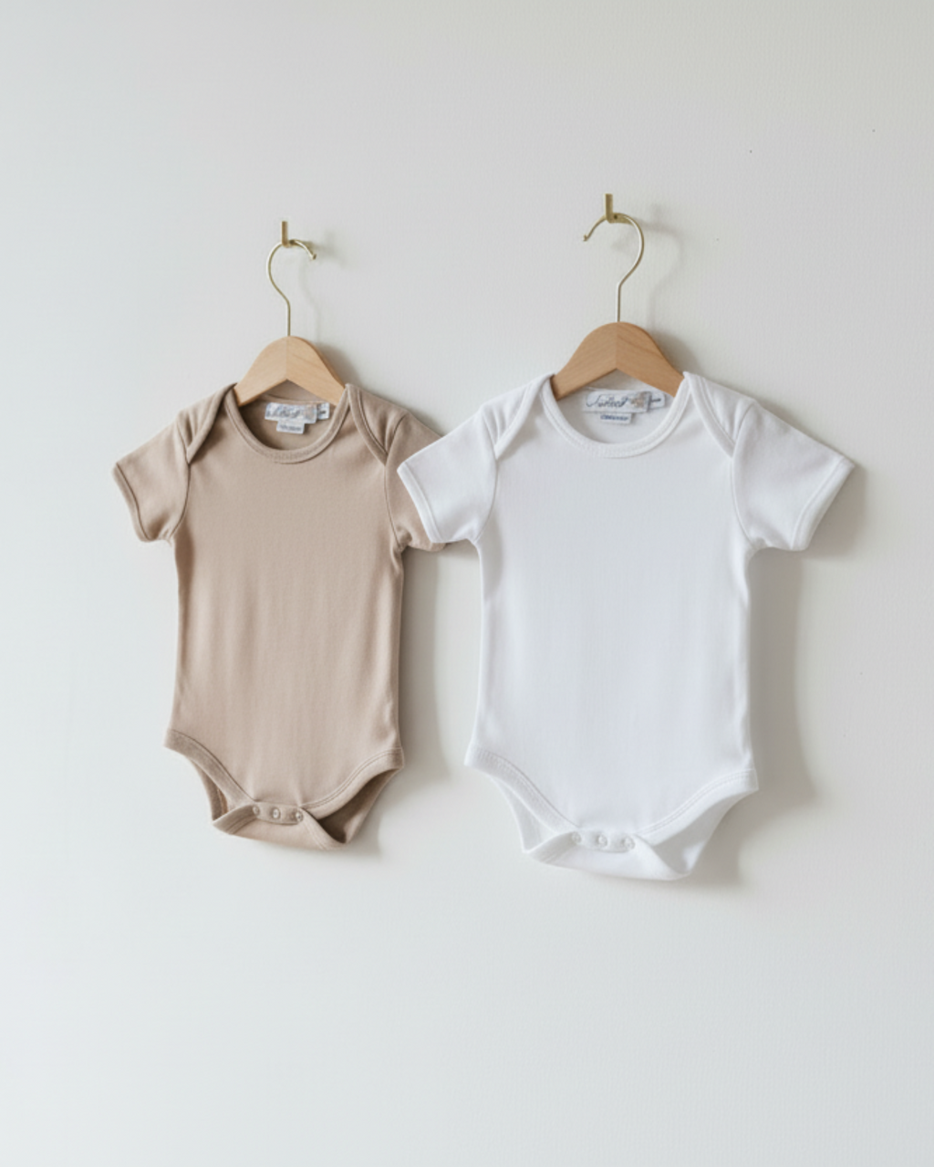 White, Oatmeal, Lifestyle  Nolhill Astor 2-day bodysuit rotation set in Pima cotton, front view 