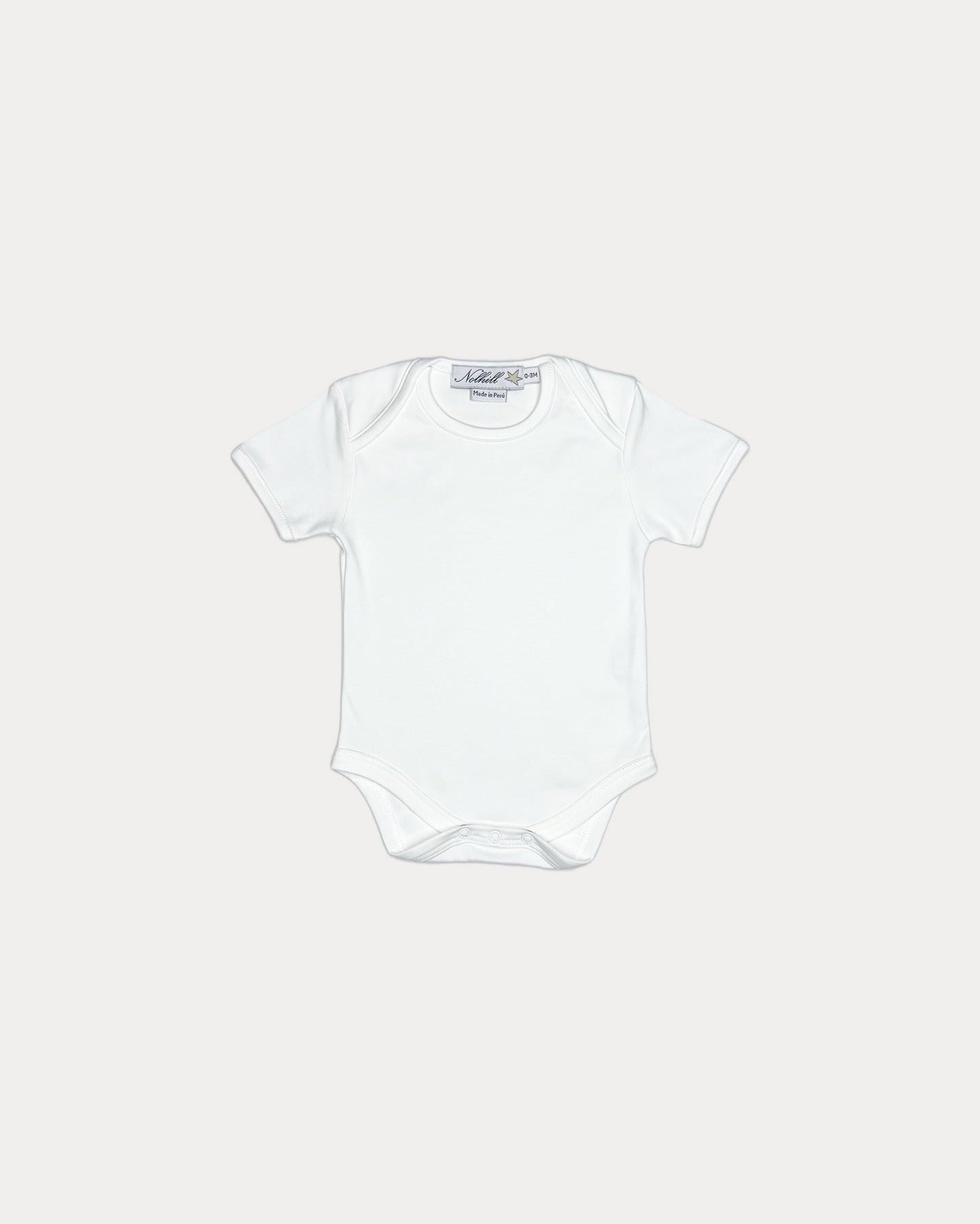 White, Nolhill Essential short-sleeve bodysuit in cloud white Pima cotton with lap-neck design, front view