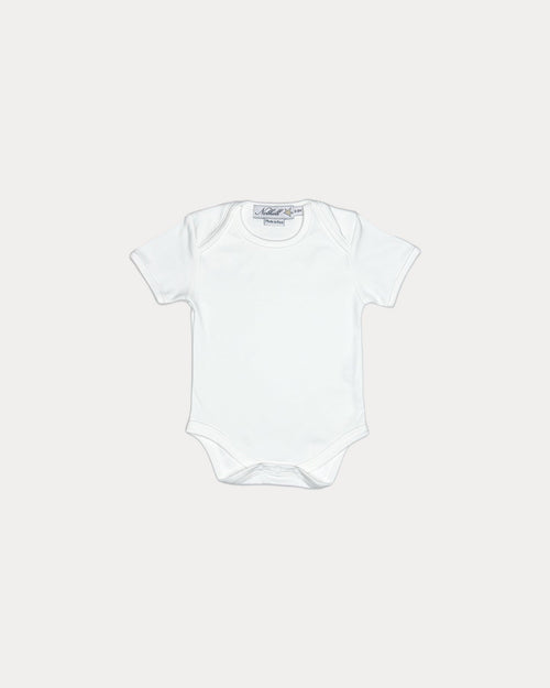 White, Nolhill Essential short-sleeve bodysuit in cloud white Pima cotton with lap-neck design, front view