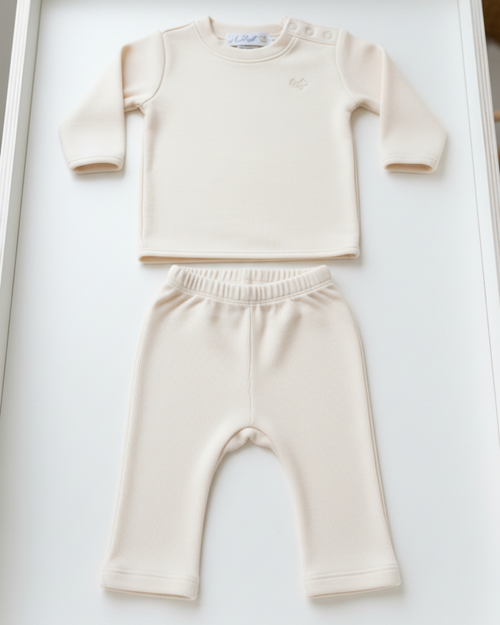 Bianca-, Lifestyle Nolhill Freya 2-piece Piqué layette set in cream Pima cotton with tonal embroidery, front view