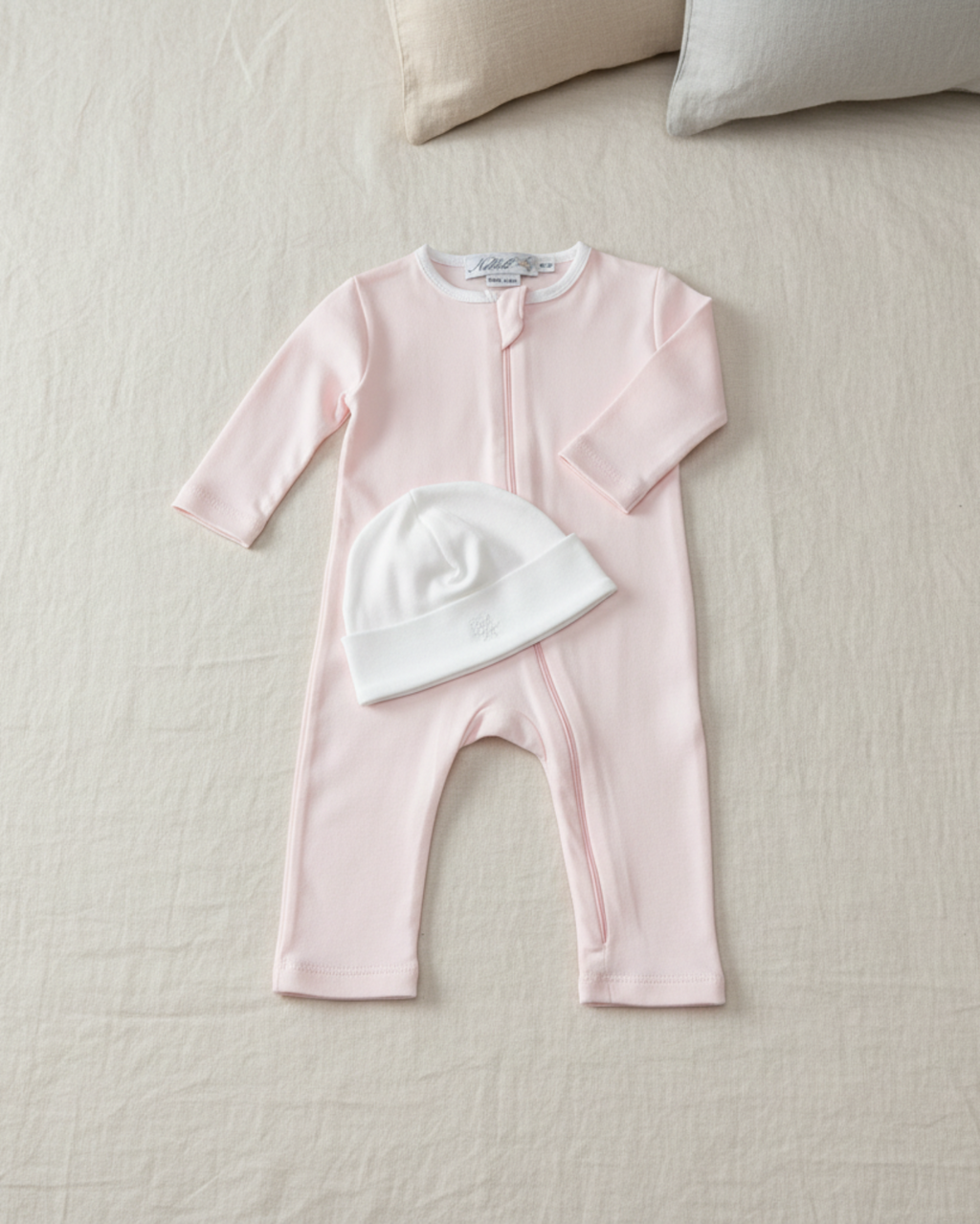 Rose, Lifestyle Nolhill Gramercy Boy newborn gift set with Lina romper and Valentine Beane in Pima cotton.