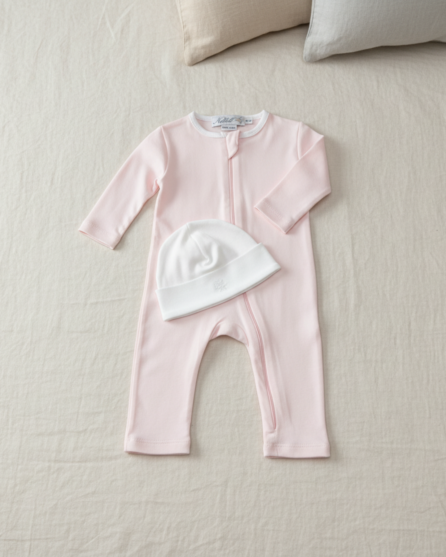 Rose, Lifestyle Nolhill Gramercy Boy newborn gift set with Lina romper and Valentine Beane in Pima cotton.