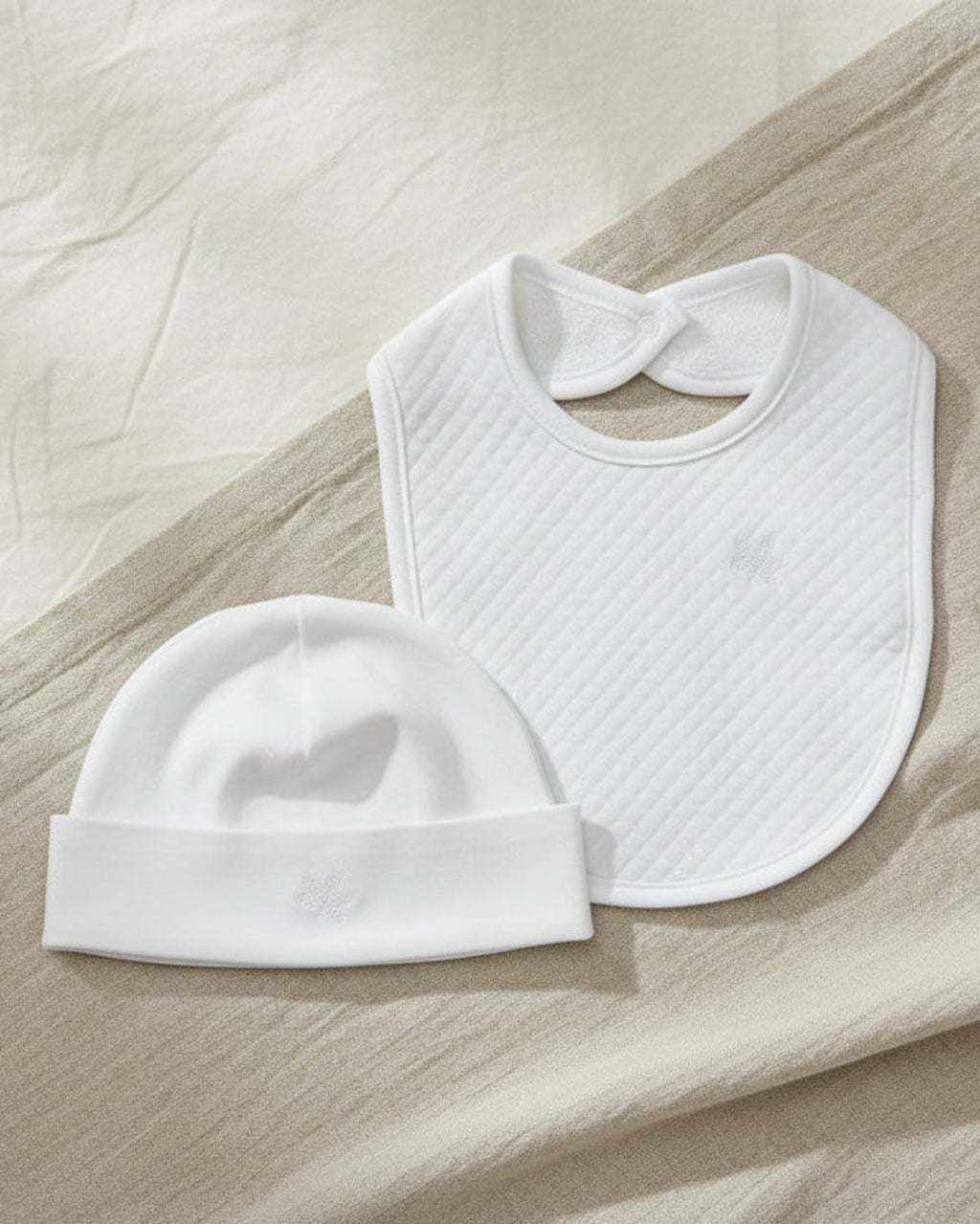White, Lifestyle Nolhill Mercer complete newborn gift set with beanie and bib in Pima cotton