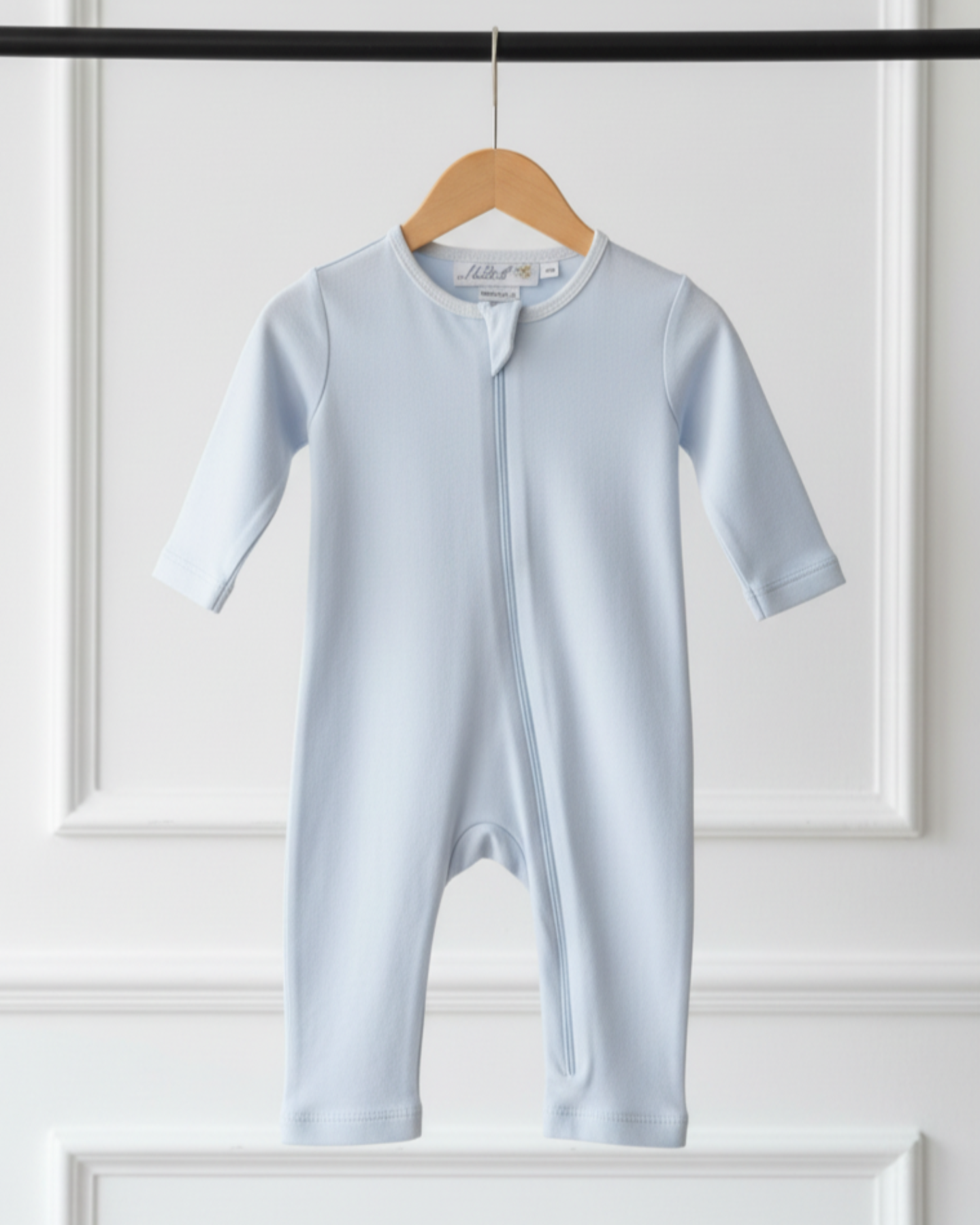 Arctic blue, Lifestyle Nolhill Nicolas footless romper in arctic blue Pima cotton with hidden zipper, front view