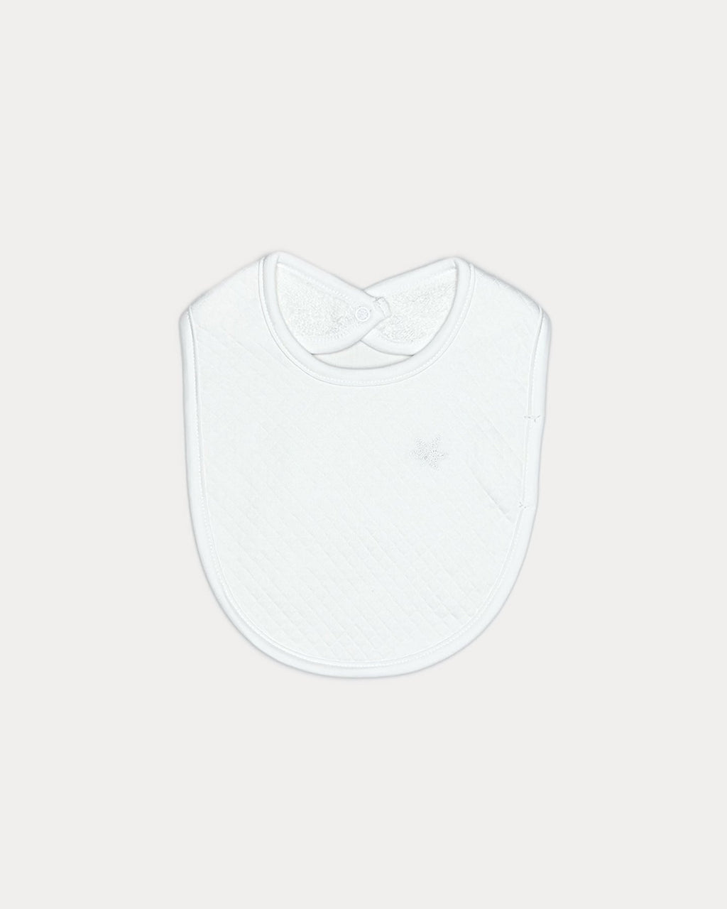 white, Nolhill Remy quilted bib in Pima cotton with tonal embroidery, front view