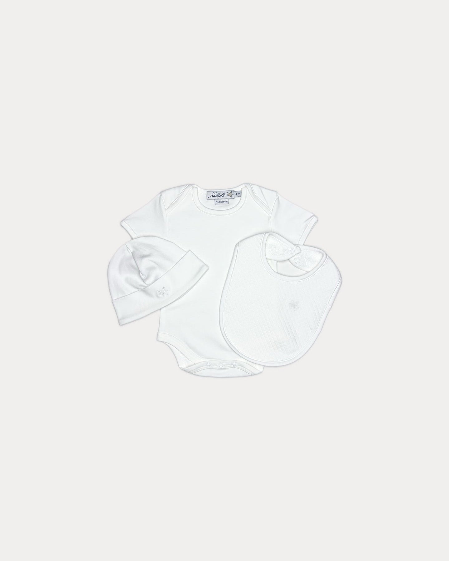 White,  Nolhill Starter 3-piece newborn essentials set with bodysuit, beanie and bib in Pima cotton